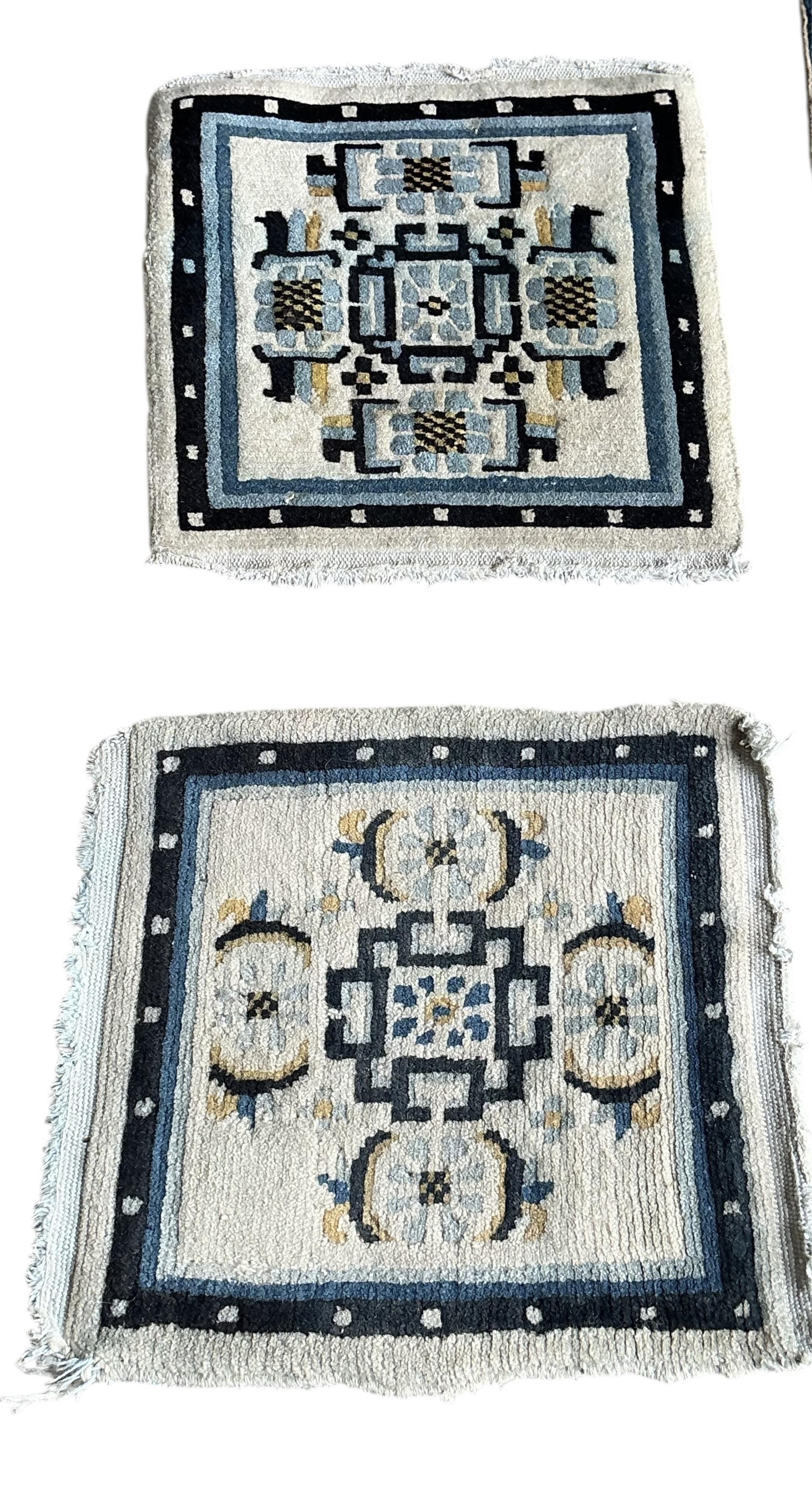 Two Sino-Tibetan ivory ground rugs, 19th century and two Tibetan ivory ground square mats, largest 120 x 66cm